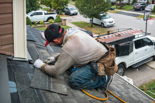 Professional Roofing technician working in Conway, WA